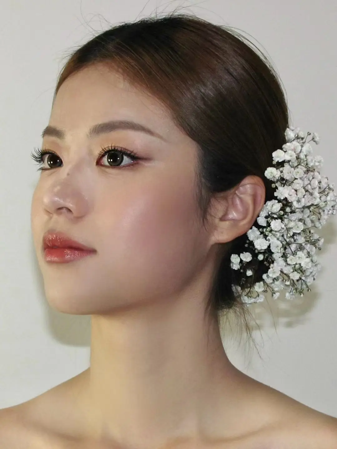 Bridal beauty portrait with baby's breath flowers