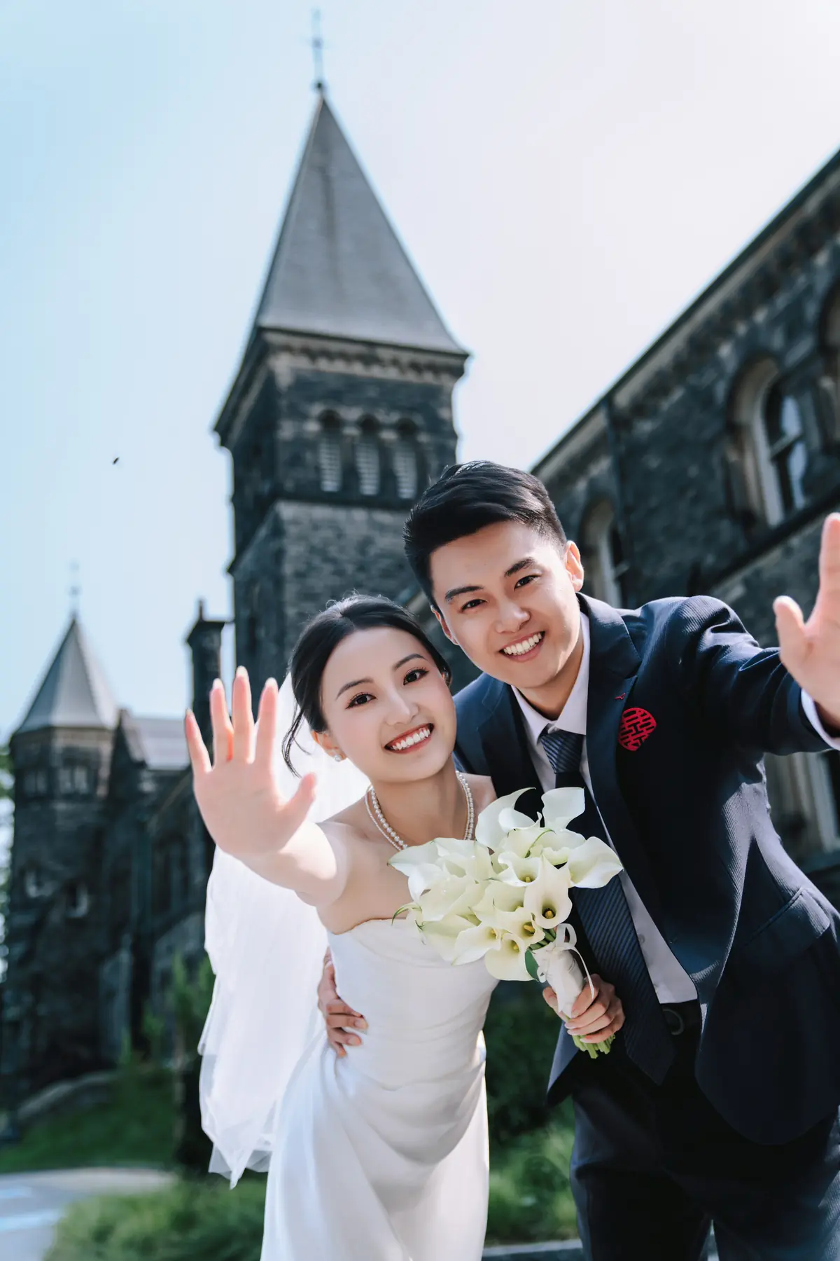Newlyweds outside a historic venue
