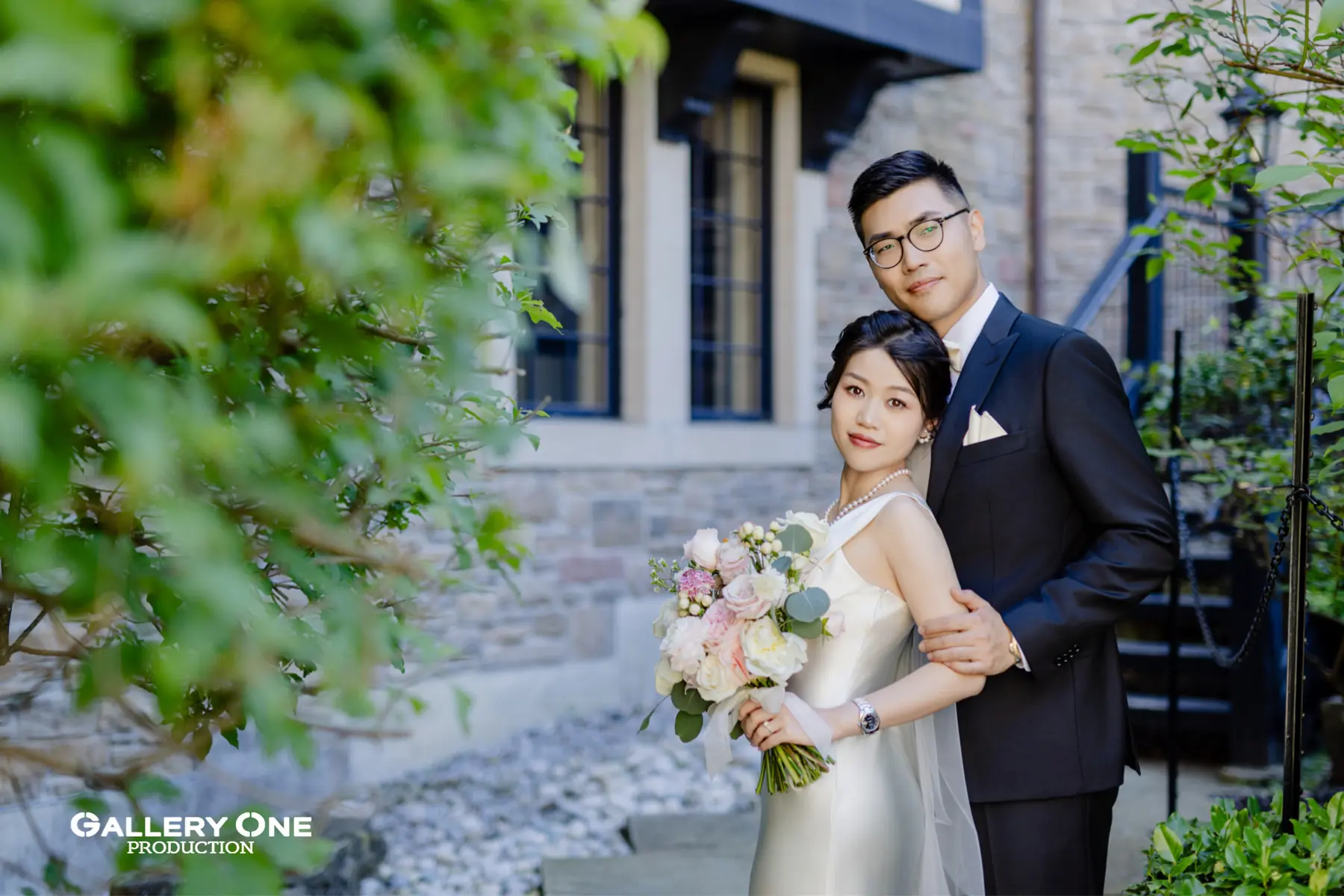 Garden wedding portrait of newlyweds