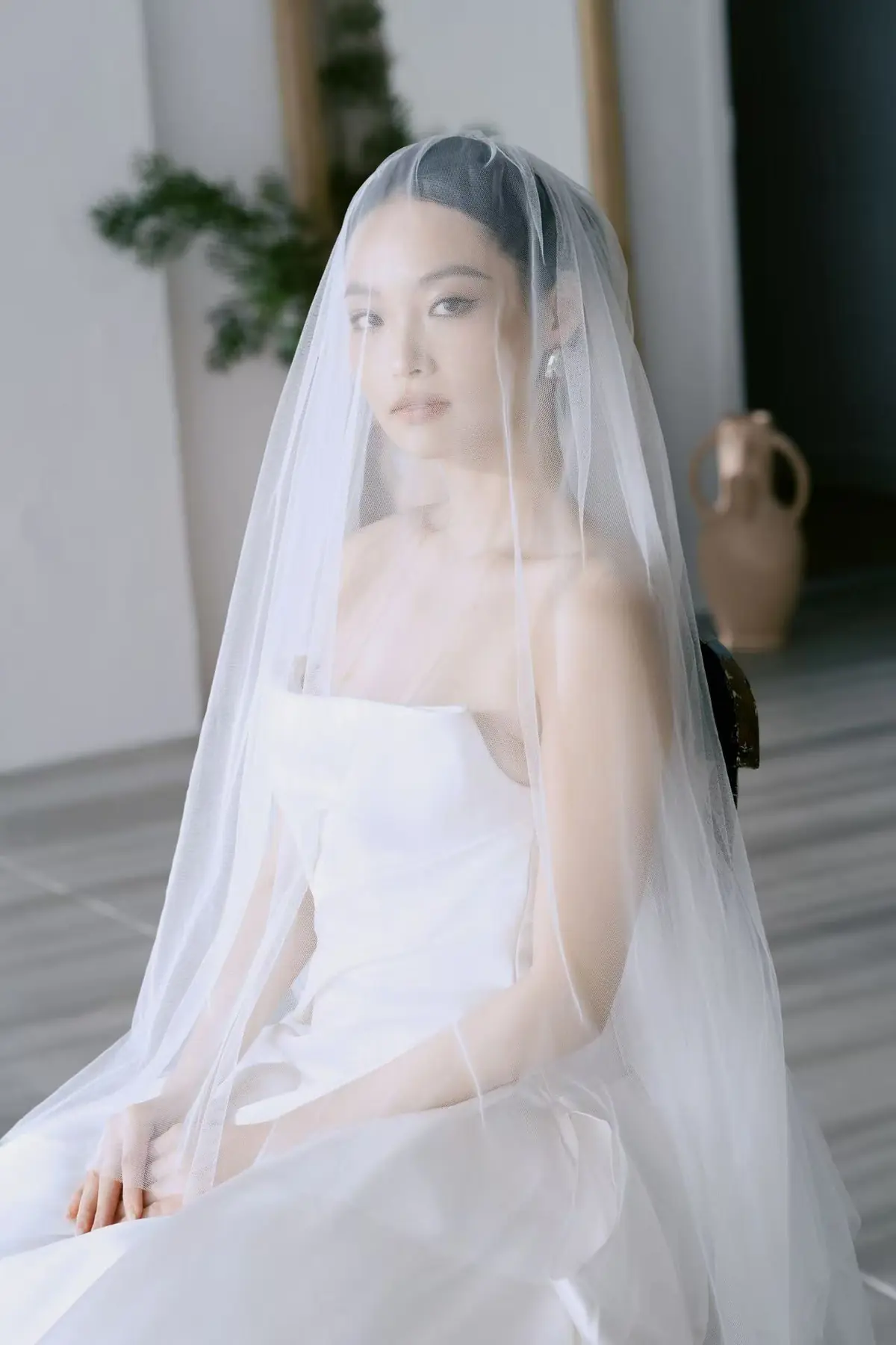 Veiled bridal portrait by Giselle