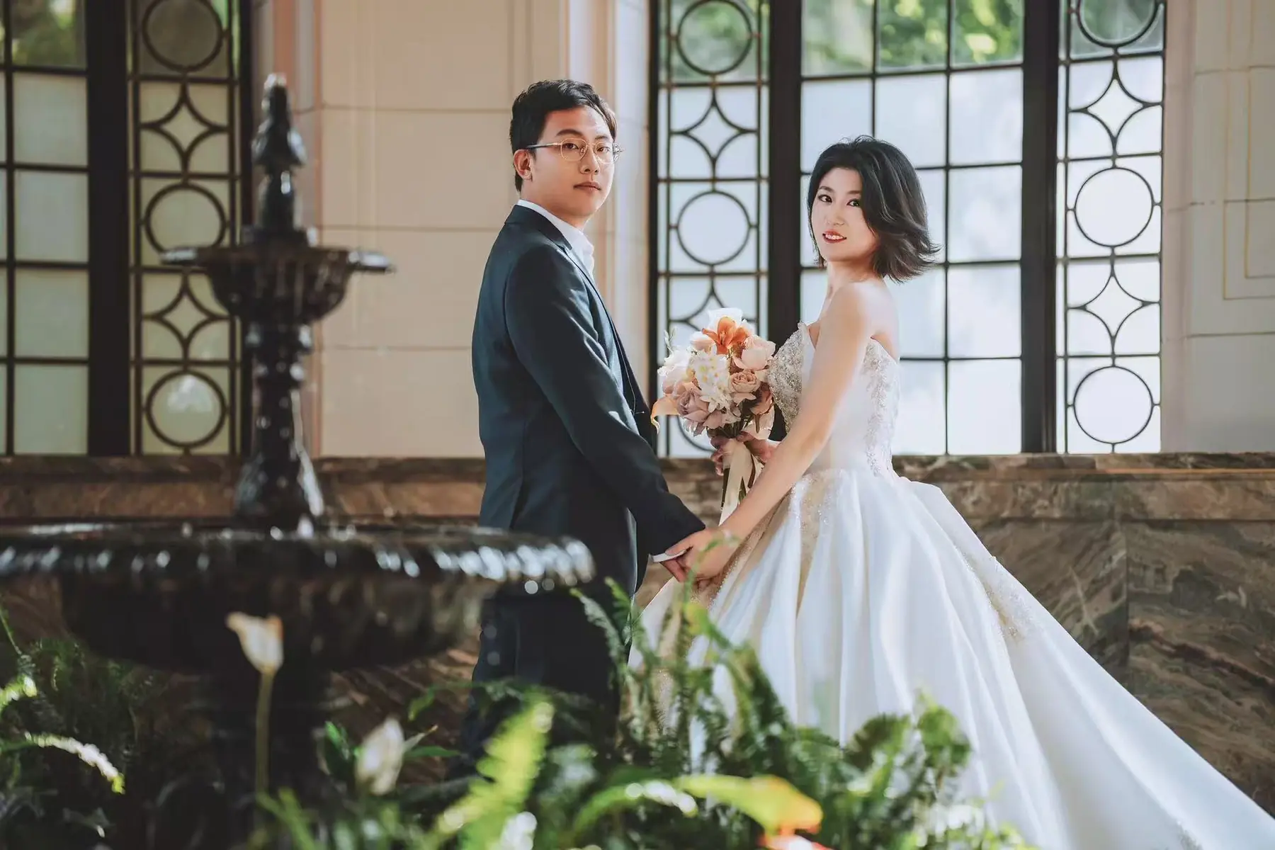 Newlyweds in a historic interior