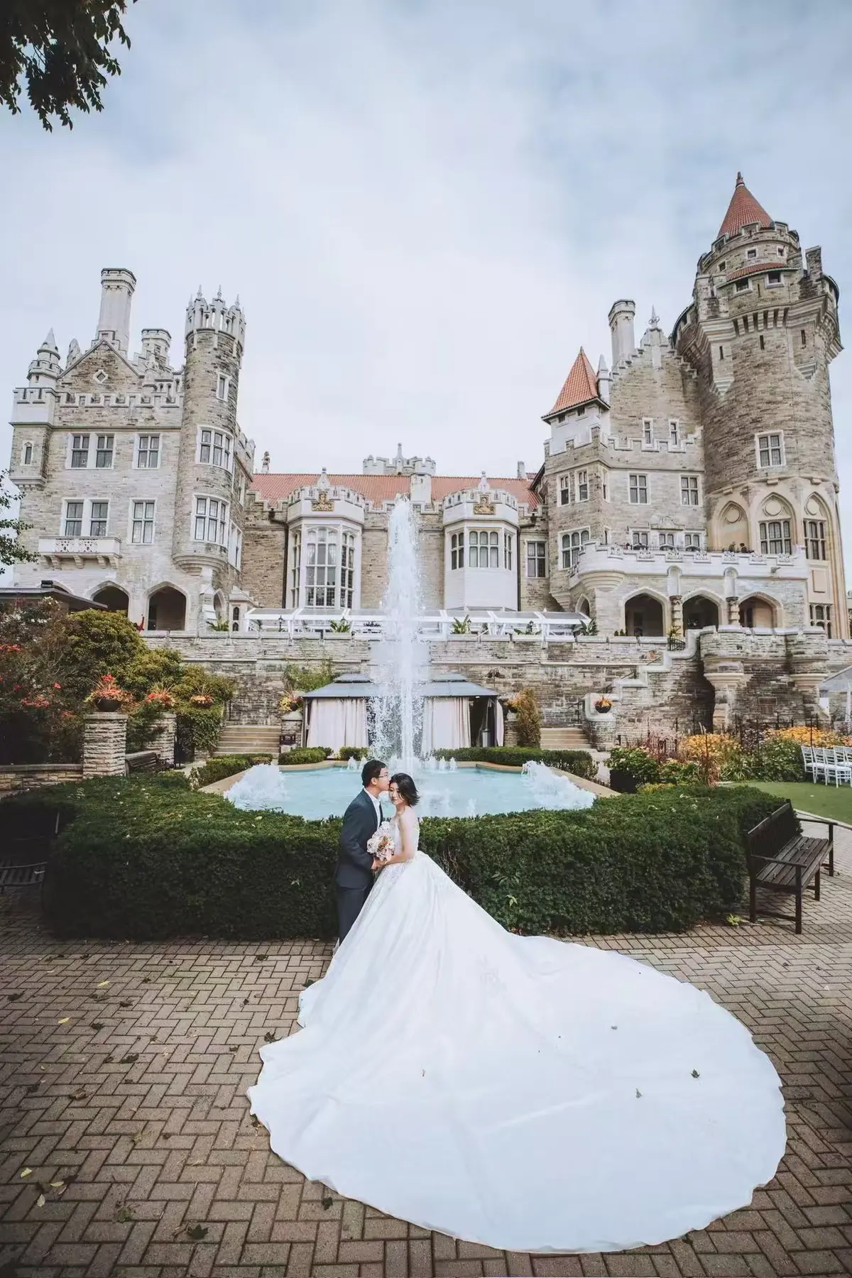 Newlyweds outside a landmark castle venue