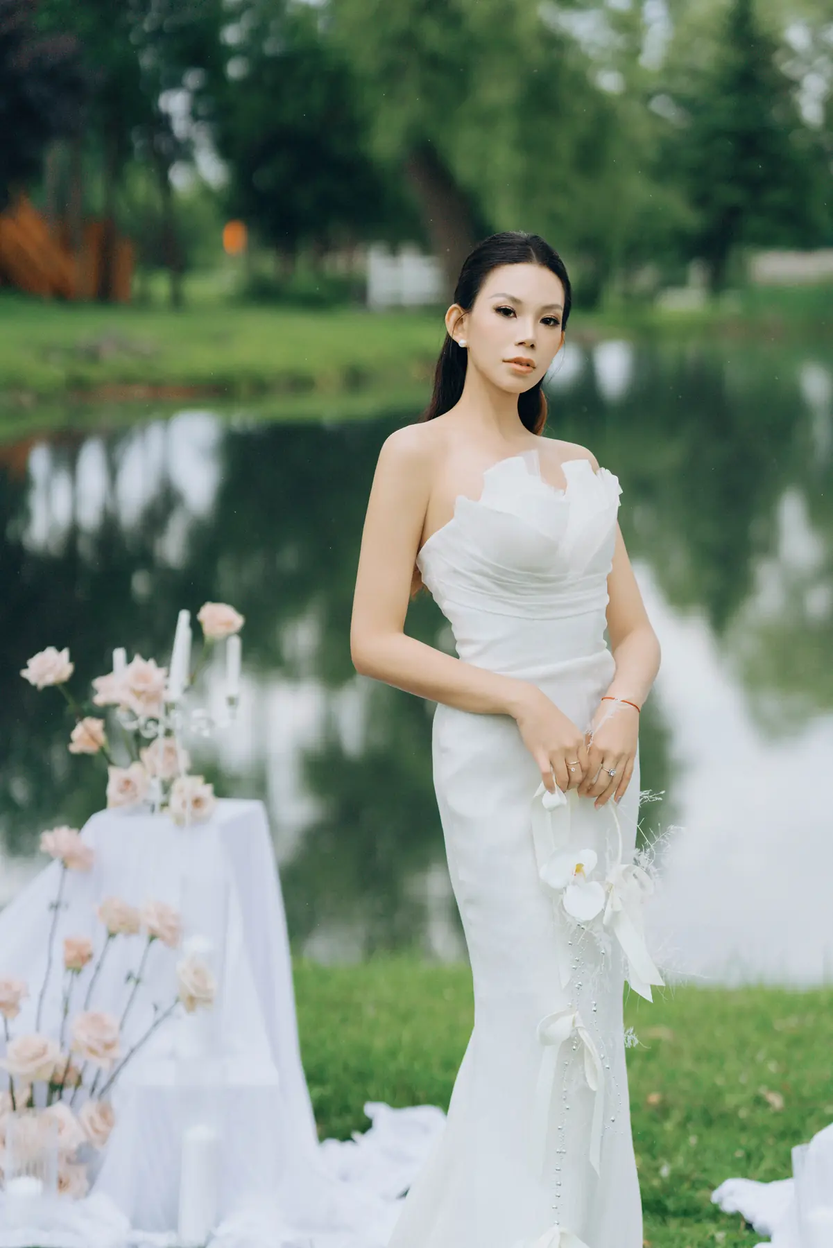 Garden bridal portrait in a modern white gown