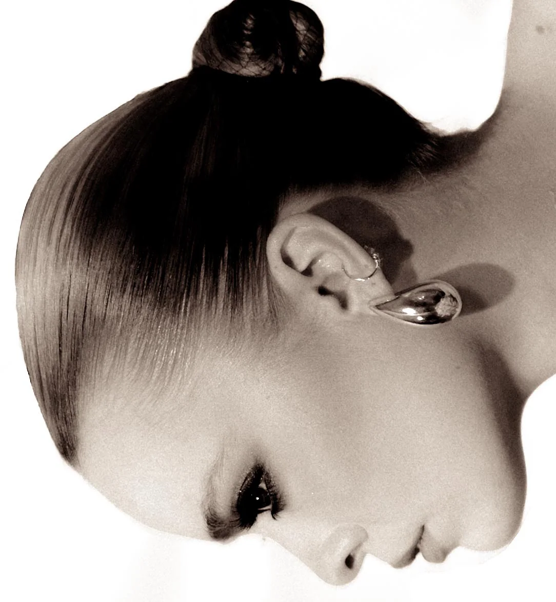 Monochrome beauty profile with sculptural jewellery