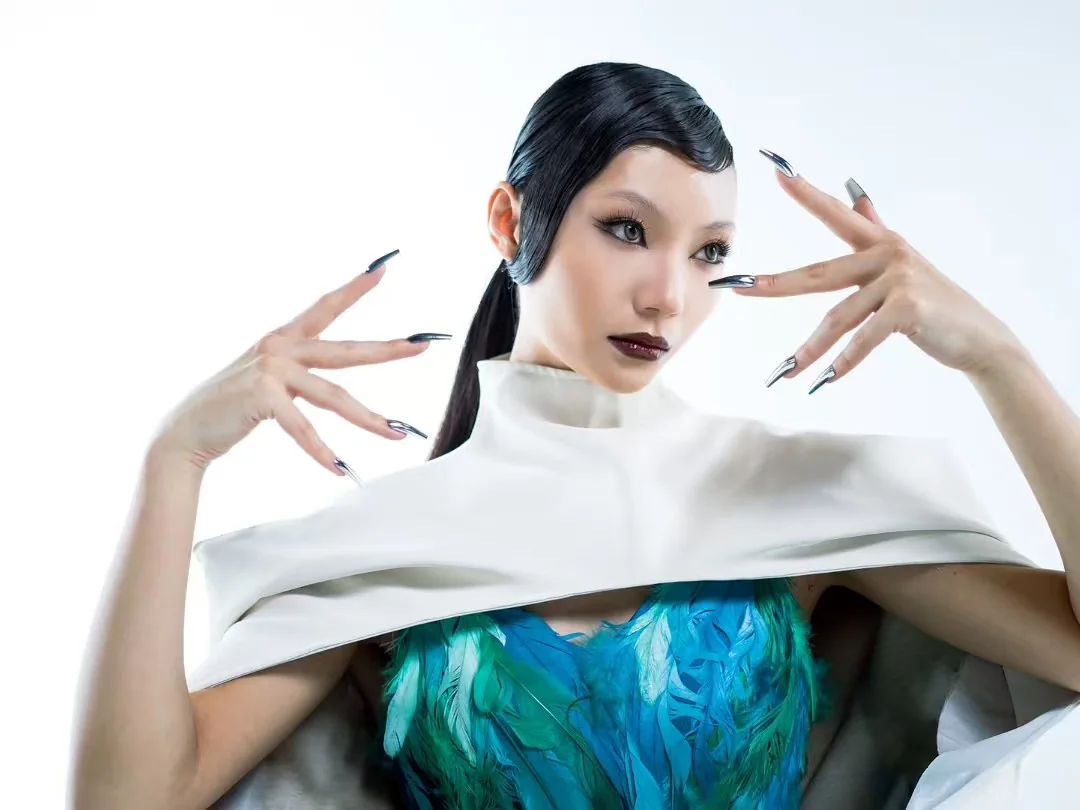 Graphic fashion portrait with sculptural white styling
