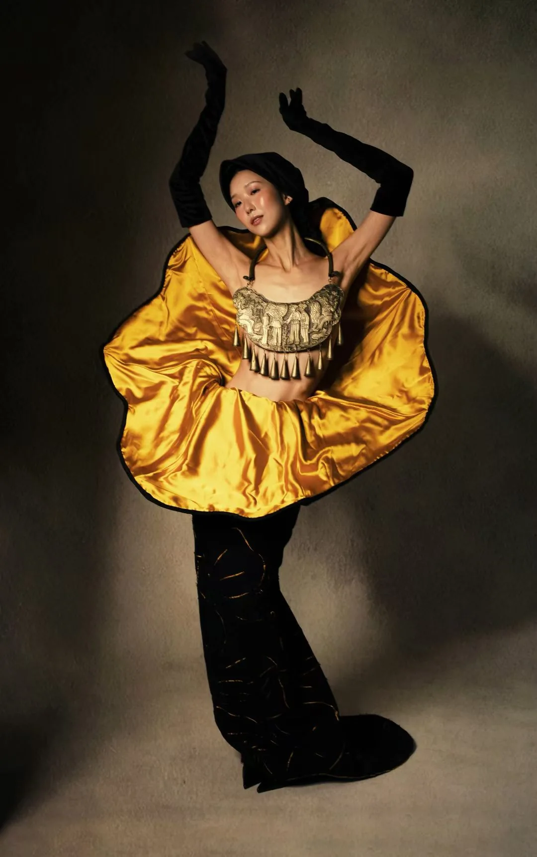 Full-length editorial fashion styling in yellow and black